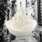 Bowl of soft serve ice cream in a black and white street setting