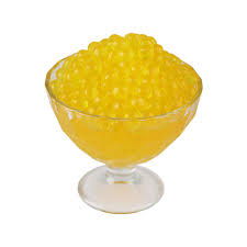 Passionfruit popping boba used in a dessert bowl