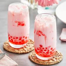 Strawberry flavour powder added to a milk tea drink