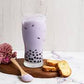 Taro flavour powder mixed into a purple taro milk tea